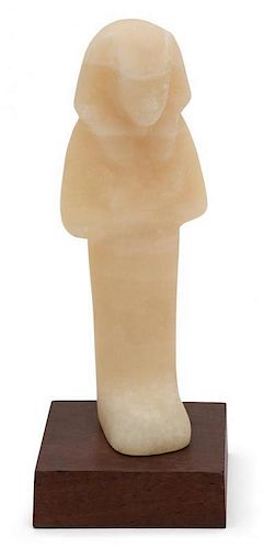 An Egyptian Carved Alabaster Figure of a Pharaoh Height 8 1/2 inches.