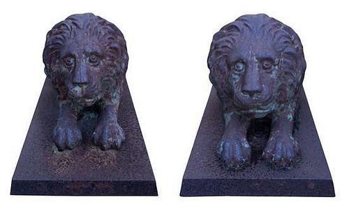 A Pair of Cast Iron Figures Length 54 1/2 inches.