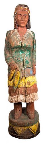 A Carved and Polychrome Decorated Squaw Advertising Figure Height 70 inches.