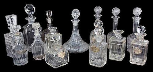 A Collection of Cut, Blown and Molded Glass Decanters Height of tallest 15 inches.