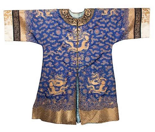 Eight Chinese Embroidered Silk Robes Length of longest 55 inches.