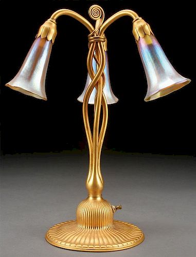 A FINE TIFFANY STUDIOS GILT BRONZE LILY LAMP