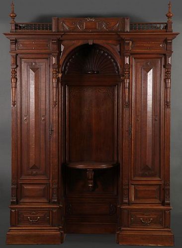 A LARGE AND IMPRESSIVE CARVED OAK CABINET WITH