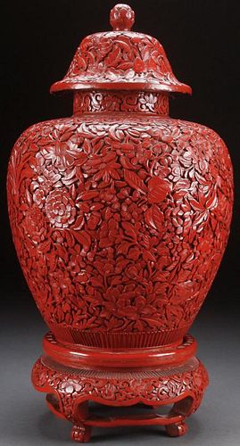 A LARGE CHINESE LIDDED CINNABAR LACQUERED URN