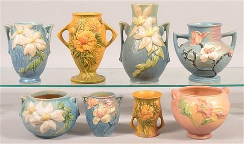 Eight Pieces of Roseville Art Pottery Vases.