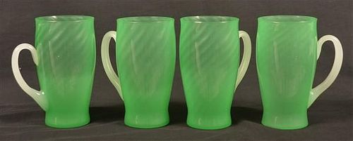 Set of Four Signed Stueben Green Opalescent Mugs.