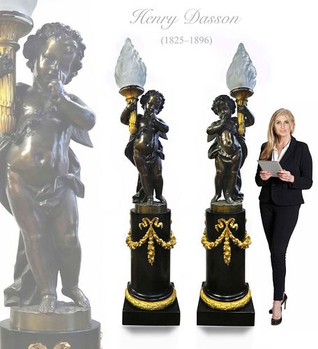 PAIR OF MONUMENTAL HENRY DASSON FIGURAL TORCHIERE LAMP