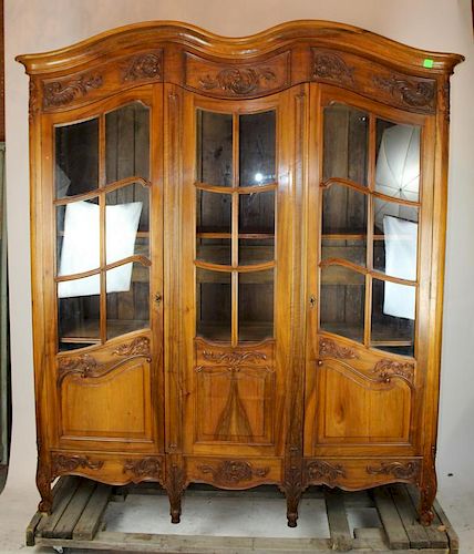 French Louis XV 3 door bookcase with paned glass.