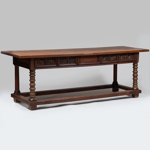Pair of Baroque Style Carved Walnut and Fruitwood Trestle Tables