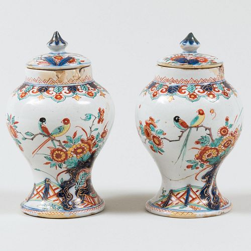 Pair of Small Dutch Polychrome Delft Pottery Jars and Covers