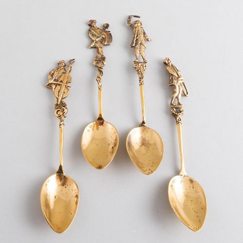 Set of Four Continental Silver Gilt Spoons with Musician Finials