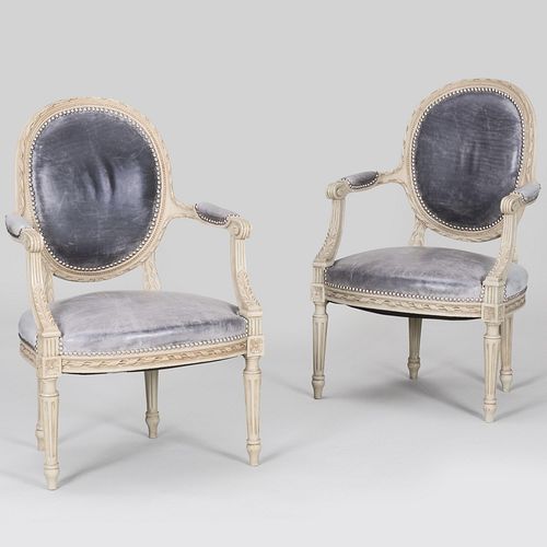 Pair of Louis XVI Style White Painted and Leather Fauteuils en Cabriolet