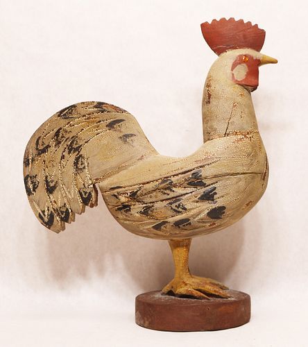 Folk art carving of a rooster