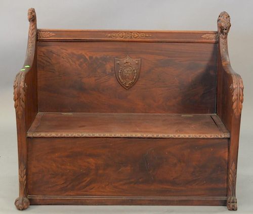 Victorian mahogany bench with shield in the center marked Etile et Dulce 1723 flanked by carved lion head and paw feet on one