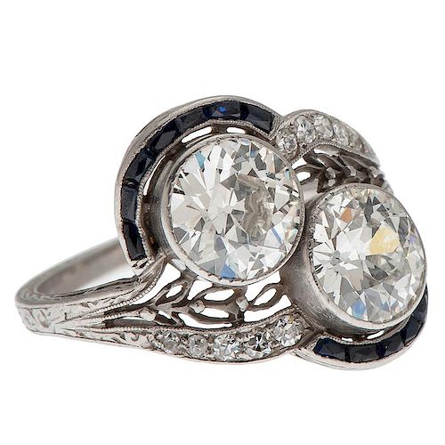 Two Diamond Ring in Platinum with Sapphires
