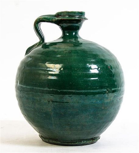 A Green Glazed Water Vessel, Height 10 1/4 inches.