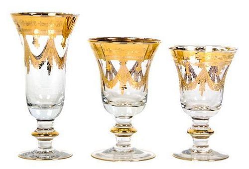 A Gilt Decorated Glass Stemware Service, Height of tallest 7 1/2 inches.