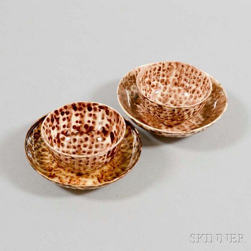 Two Tortoiseshell-glazed Earthenware Teacups and Saucers