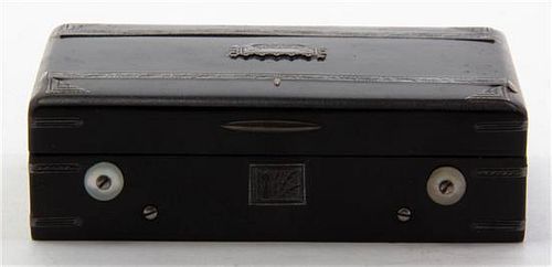 * A Continental Ebonized Musical Snuff Box, Height 1 1/8 inches x width 3 7/8 x depth 2 3/8 inches.