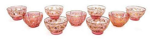 An Assembled Set of Cranberry Glass Bowls, PROBABLY MOSER, Diameter of each 5 1/4 inches.