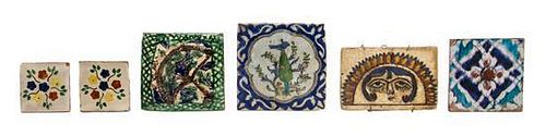 Nine Middle Eastern Style Pottery Tiles, Height of largest 12 1/4 x width 9 inches.