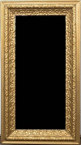 A Victorian Giltwood Over Mantel Mirror, Height 27 1/2 x width 50 inches.