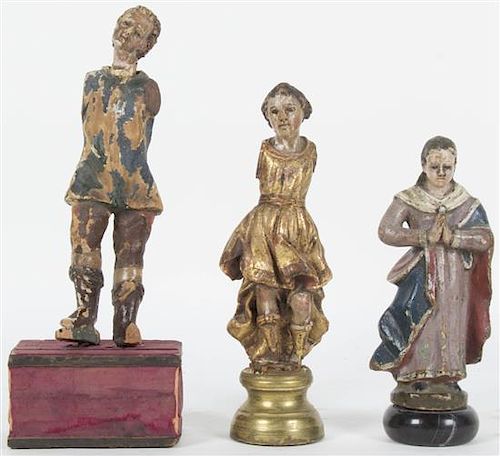 A Group of Polychrome Decorated Ecclesiastic Figures, Height of tallest 7 1/4 inches.