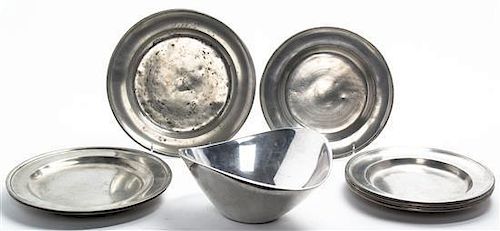 A Set of Eight Pewter Plates, Diameter of largest 9 1/2 inches.