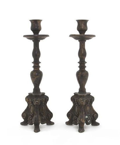 A Pair of Neoclassical Bronze Candlesticks, Height 9 3/4 inches.