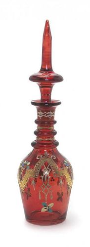 A Bohemian Ruby Glass Decanter, 19TH CENTURY, Height 13 1/2 inches.