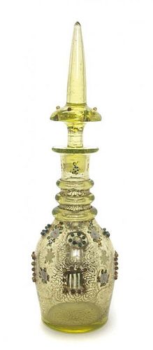 A Bohemian Green Glass Decanter, 19TH CENTURY, Height 13 inches.