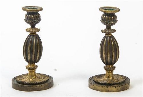 A Pair of Gilt Bronze Candlesticks, Height of each 7 inches.
