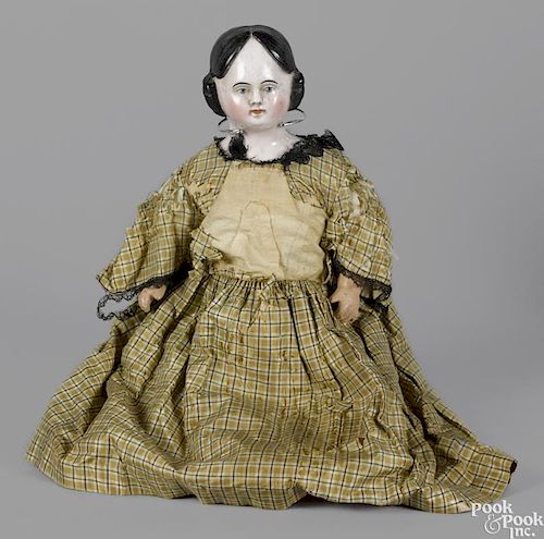 Molded hair China head doll with a painted shoulder head on a cloth stuffed body