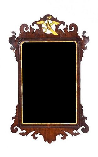 A George II Parcel Gilt Mahogany Mirror, MID-18TH CENTURY, Height 28 1/2 x width 17 3/4 inches.