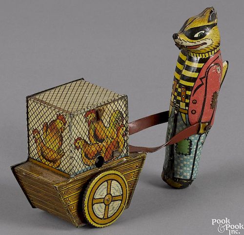 Argentina tin lithograph wind-up fox pushing a cart with a hen house, 4 1/2'' h.