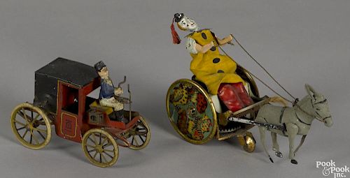 Two Lehmann tin wind-up toys, to include a ''Balky Mule'' with a clown driver, 7 1/2'' l.