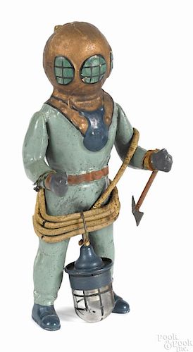 Painted metal deep sea diver figure, probably Bing, to include the original axe