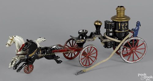 Cast iron horse drawn fire pumper, overall - 19'' l.