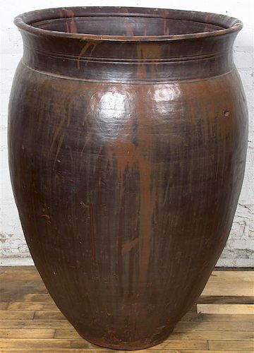 A Large Ceramic Storage Vessel, Height 40 3/4 inches.