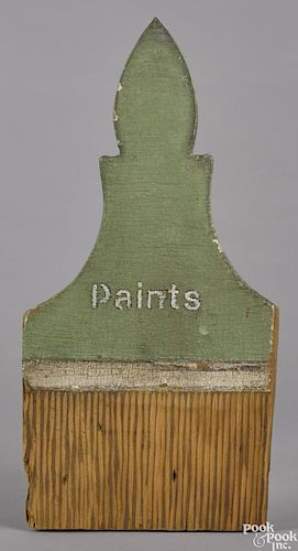 Paint brush painted pine trade sign, inscribed Paints, on an original green and white surface