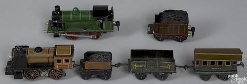 German O Gauge train engines and cars, to include a Marklin no. 1030 clockwork locomotive