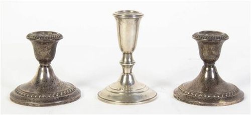 * A Pair of American Silver Small Candlesticks, Gorham Mfg. Co., Providence, RI, weighted, with gadrooned borders, together with
