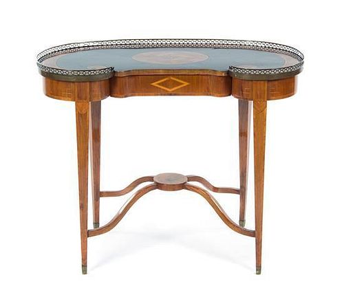 A Continental Parcel Ebonized Writing Table, 19TH CENTURY, Height 29 x width 36 3/4 x depth 16 1/2 inches.