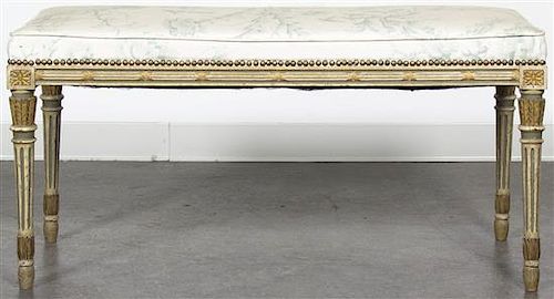 A Louis XVI Style Painted and Parcel Gilt Window Seat, Height 19 1/2 x width 40 x depth 16 inches.
