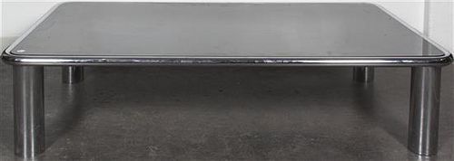 * A Chromed and Mirrored Low Table, Height 14 1/2 x width 62 1/2 x depth 35 1/4 inches.