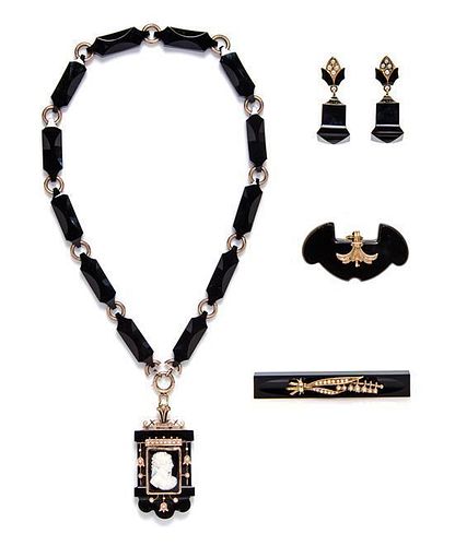 A Collection of Victorian Gold, Onyx, Seed Pearl, Enamel and Cameo Mourning Jewelry, 71.90 dwts.