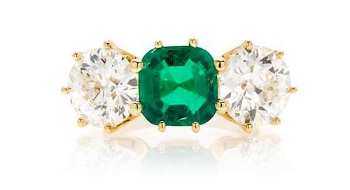 An 18 Karat Gold, Emerald and Diamond Ring, 4.80 dwts.