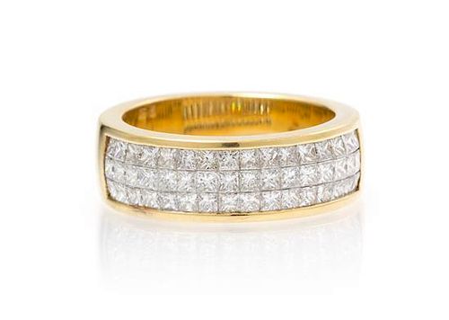 * An 18 Karat Yellow Gold and Diamond Ring, 12.30 dwts.