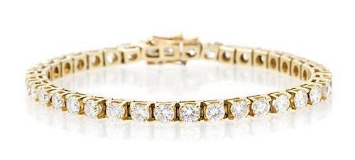 A 14 Karat Yellow Gold and Diamond Line Bracelet, 9.30 dwts.