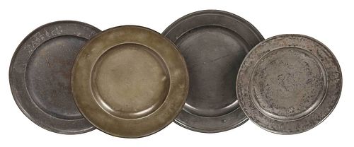 Four Large British Pewter Chargers